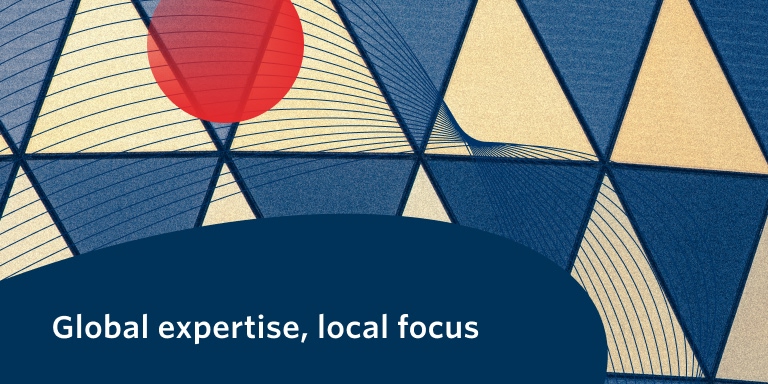 Abstract geometric design with yellow and blue triangular patterns, a red circle, curved line accents, and the text 'Global expertise, local focus' at the bottom.