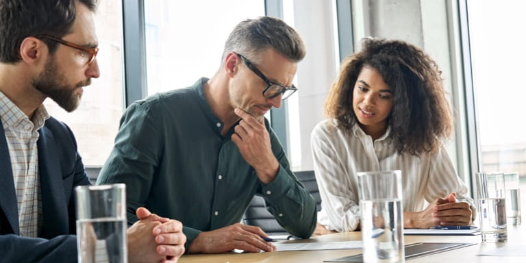 Deceased estate administrator and professional executor reviewing a deceased’s documents in the deceased estate administration process.