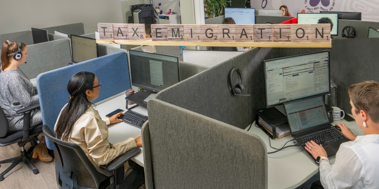 Consultants assisting clients with South African tax emigration, including SARS returns and tax clearances.