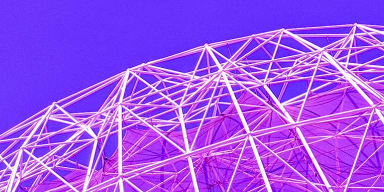 An escalator that is in a tunnel of an aquarium or body of water.