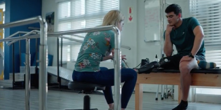 Caleb Swanepoel, SA paralympic surfer and shark attack survivor, at the gym with his physiotherapist for his amputated leg.