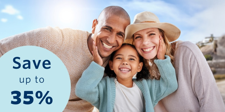 Happy family, where the mom and dad are playing with their daughter, who is sitting on her dad’s shoulders.
