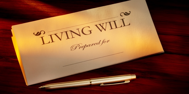 A living Will document lying on a desk, waiting to be completed.