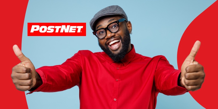 Happy young man dressed in a red shirt showcasing an exciting free will offer.