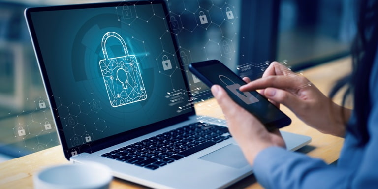 A laptop screen displaying a digital lock. 