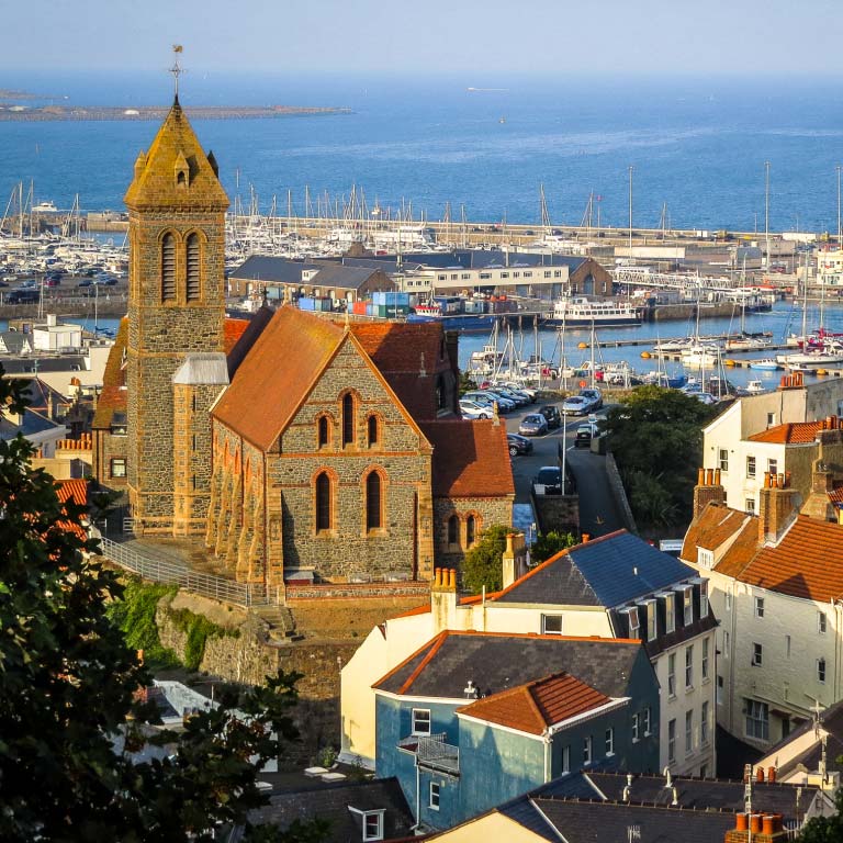 Aerial view of the Saint Peter Port at sunrise in Guernsey.