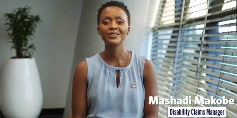 Colleagues discussing critical illness benefits.

