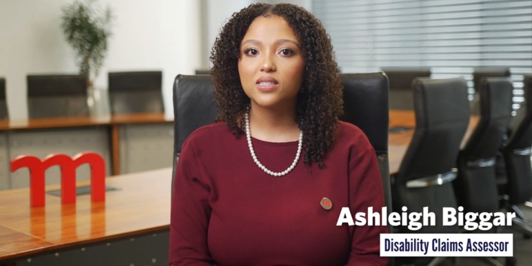 Colleagues discussing Momentum's income disability benefit.

