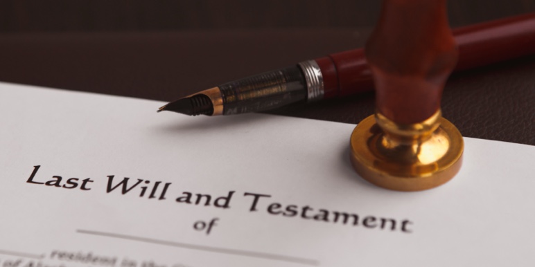 A valid drafted Will under a gavel, printed and ready to be witnessed and signed.